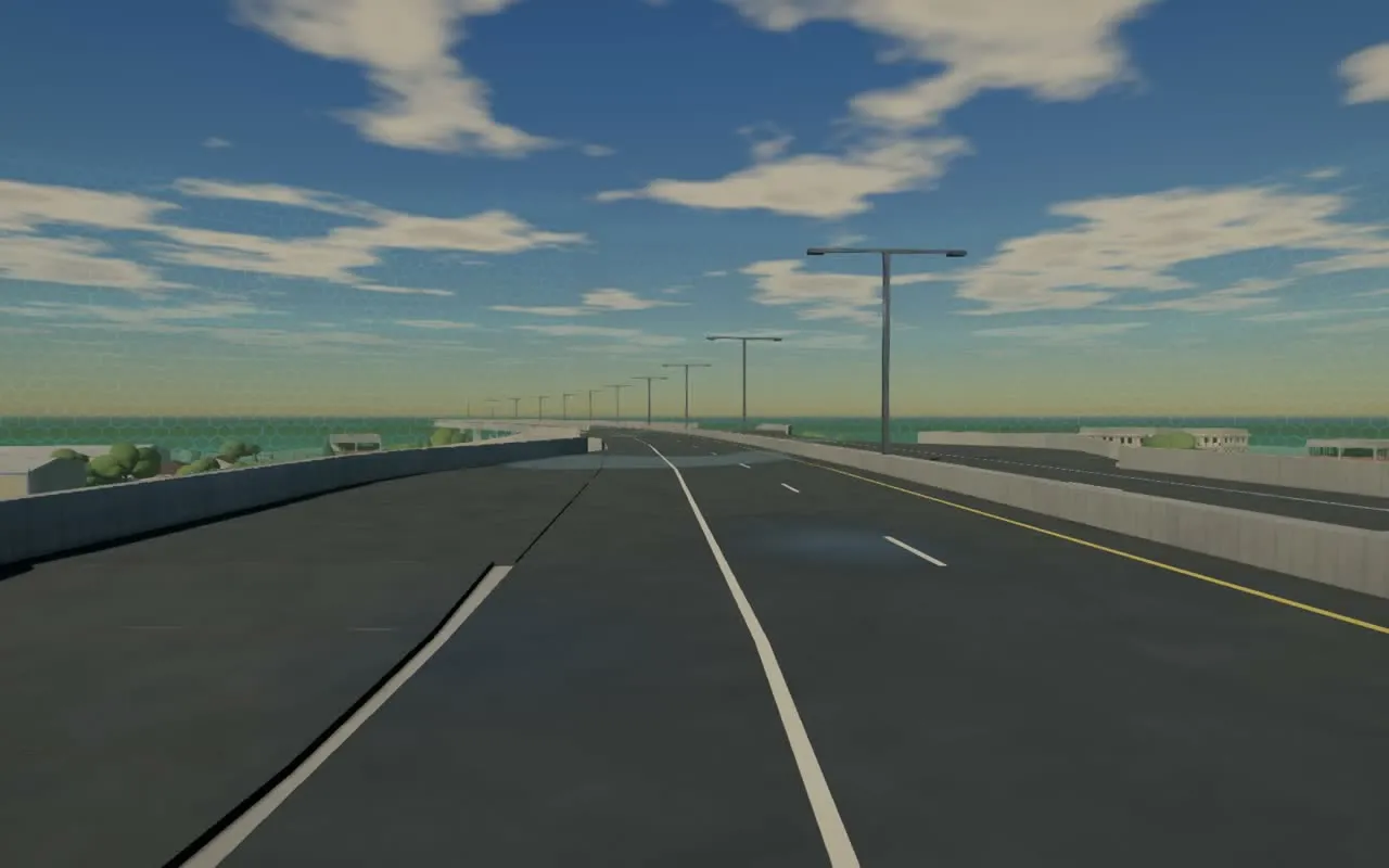 A ship’s view on the deck: two lanes each way, dashed lane lines, a yellow line by the median, lamps, and a merge lane joining from the left